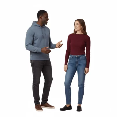 Two people standing and chatting while facing each other.
